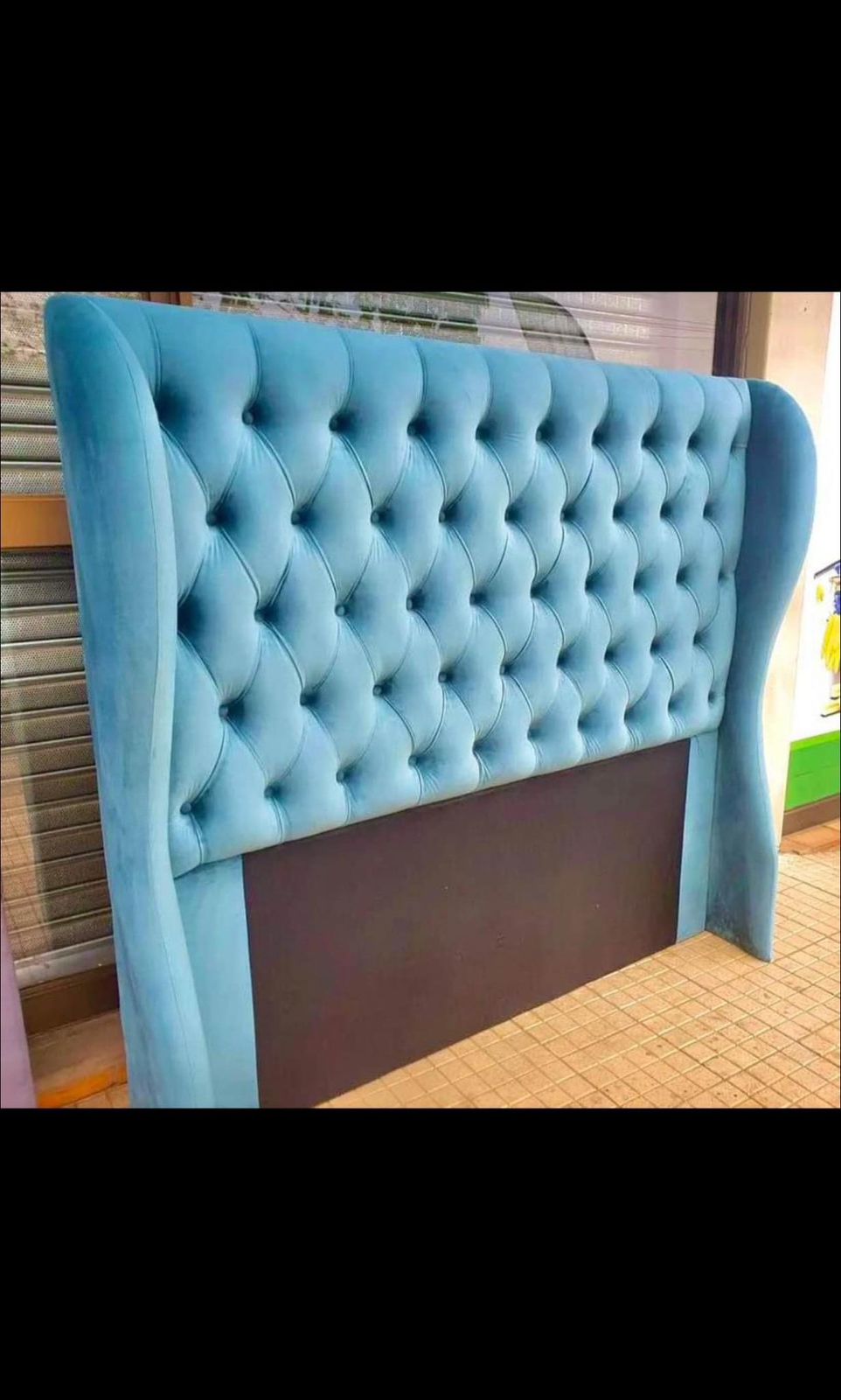 Curvy wings chesterfield headboard